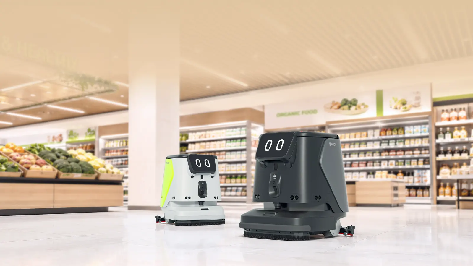 Robots fregadores PUDU CC1 Pro Disc limpiando el suelo de un supermercado